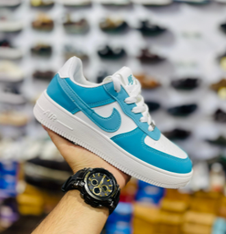 Nike Air Force 1 '07 LV8 sneakers in a Psychic Blue/University Blue/White colorway.